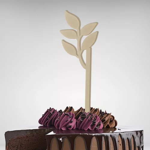 Sur le sommet de votre gâteau se dresse un Cake Topper Feuille Nature